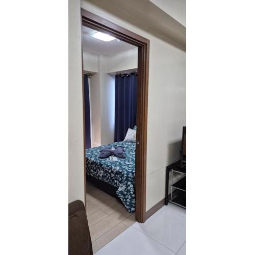 Rqui Condotel Rooms Near Airports and Newport World Casino