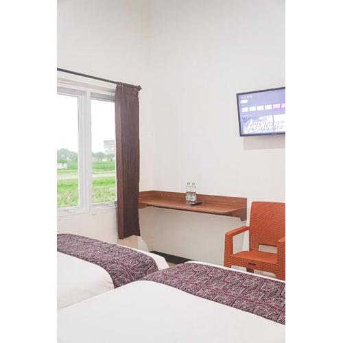 RR -2 Syariah Hotel SLG