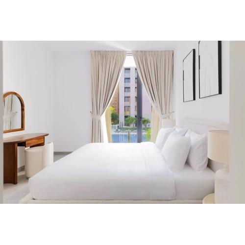 Sahab - Panoramic pool view 1BR Tiraz Building