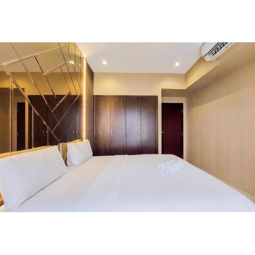 Scenic and Comfortable 2BR Branz BSD City Apartment By Travelio