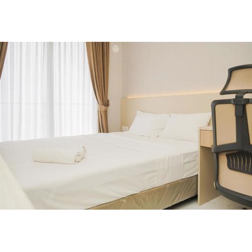 Scenic Designed and Comfy Studio at Sky House BSD Apartment By Travelio