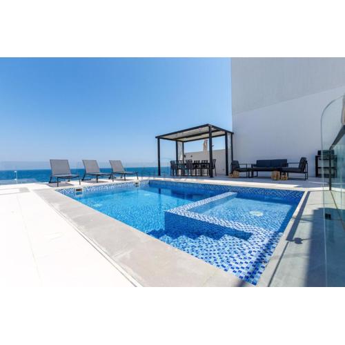 Sea-Facing 4BR Villa with Two Assistant Room, Heated Pool and Barbecue Space, Al Dana Island, Fujairah by Deluxe Holiday Homes