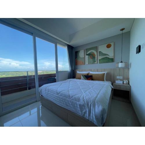 Sea View Apartment at Nuvasa Bay Kalani Tower in Nongsa Area