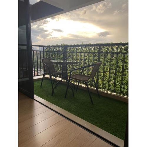 serene suites two bedroom apartment with heated swimming pool fully equipped gym ample parking space child play area and a relaxing rooftop with scenic views