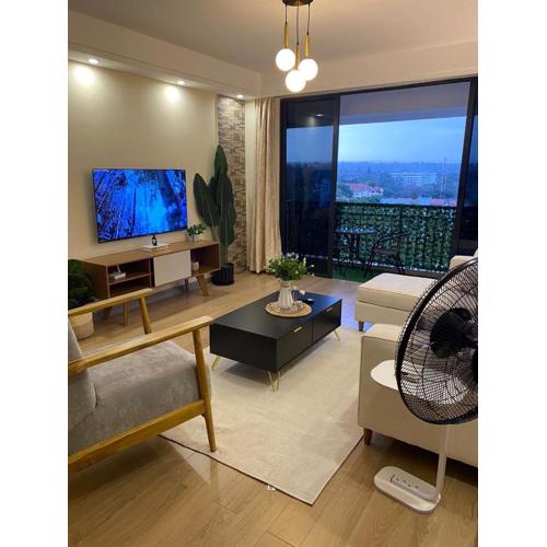 serenity heights two bedroom apartment with heated swimming pool fully equipped gym ample parking space child play area and amazing scenic views