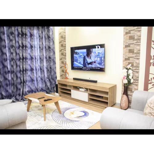 serenity springs luxury apartment with private parking,fully equipped gym ,heated swimming pool and proximity to major shopping malls