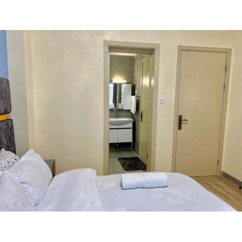 serenity suites apartment with private parking,swimming pool modern equipped gym child play area and unbeatable city views