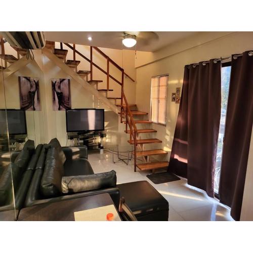 Sheryll Escapes - Kandi Resort-type Spacious 1 BR loft with Netflix and free Housekeeping
