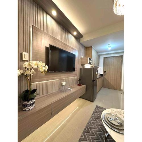 Shore 2 Residences, 1BR Balcony - Pool view