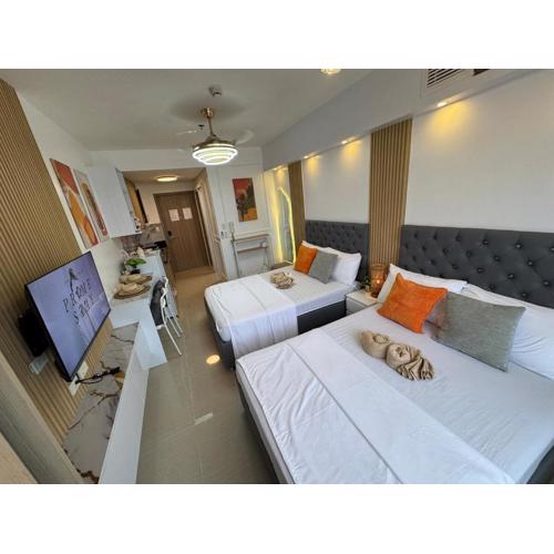 Shore 2 Residences RM 19106 Pool View by Prime Stay MOA