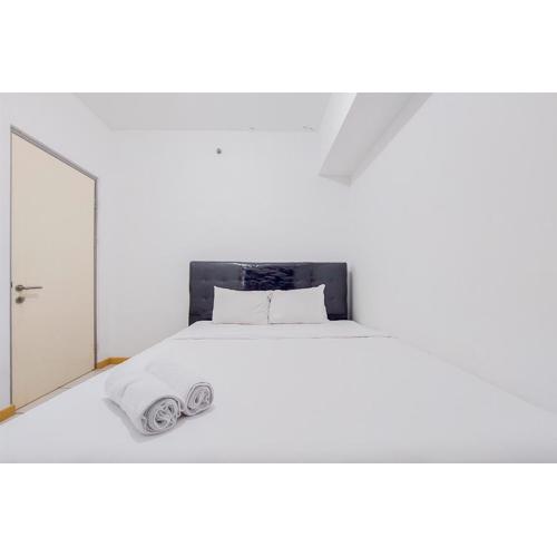 Simple and Comfort Design 2BR Apartment at M Town Residence By Travelio