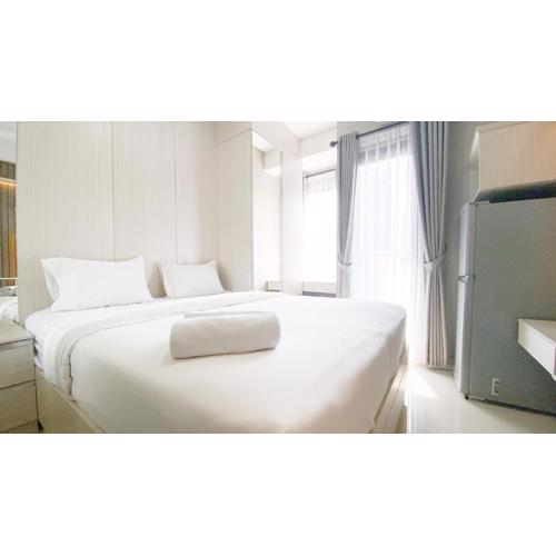 Simple and Cozy Living Studio Transpark Cibubur Apartment By Travelio