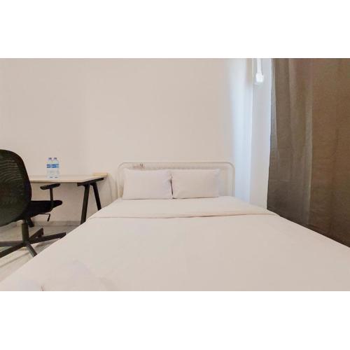 Simple and Cozy Stay Studio Sky House Alam Sutera Apartment By Travelio