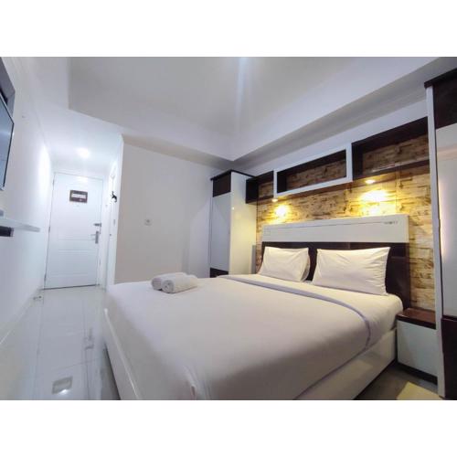 Simple and Homey Studio Room at Paltrow City Apartment By Travelio