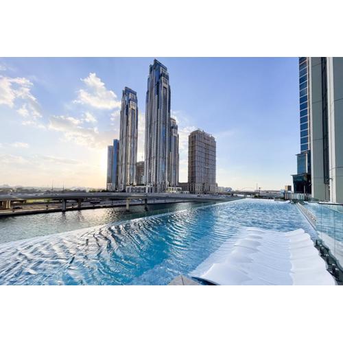 SIMPLY COMFORT in Missoni Top Floor with Sea, Canal and Burj Khalifa Views