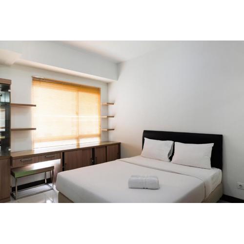 Simply Furnished Studio Apartment at Scientia Residence By Travelio