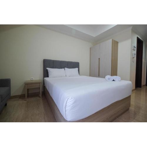 Simply Furnished Studio at Menteng Park Apartment By Travelio