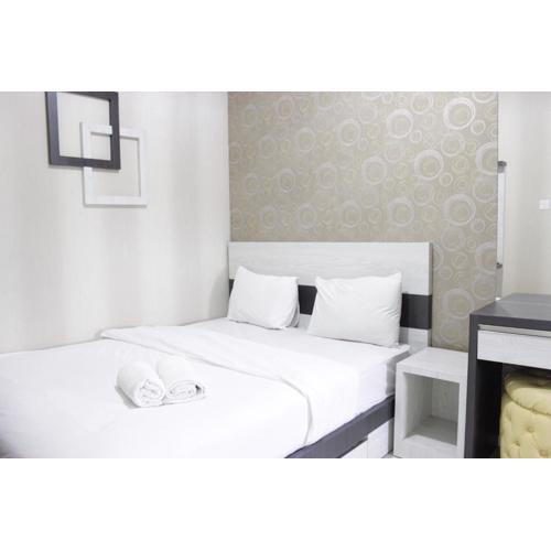 Simply Homey 2BR Apartment Parahyangan Residence By Travelio