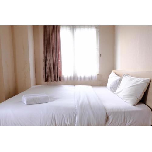 Simply Homey 2BR at 11st Floor Pinewood Apartment By Travelio