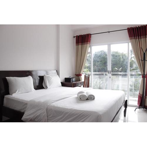 Simply Homey Studio at Gateway Pasteur Apartment near Exit Toll By Travelio