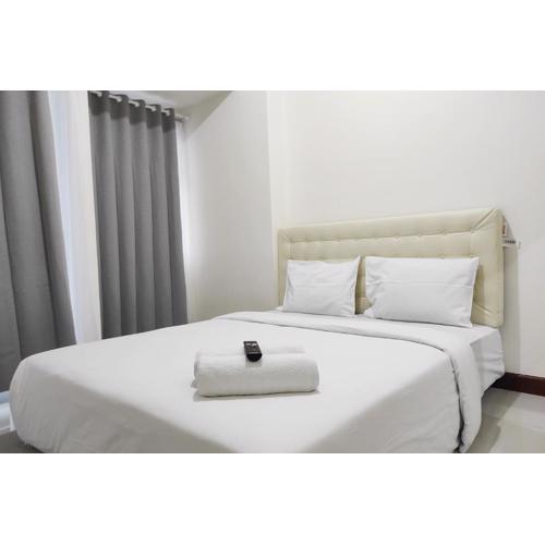 Simply Homey Studio at Vida View Apartment By Travelio