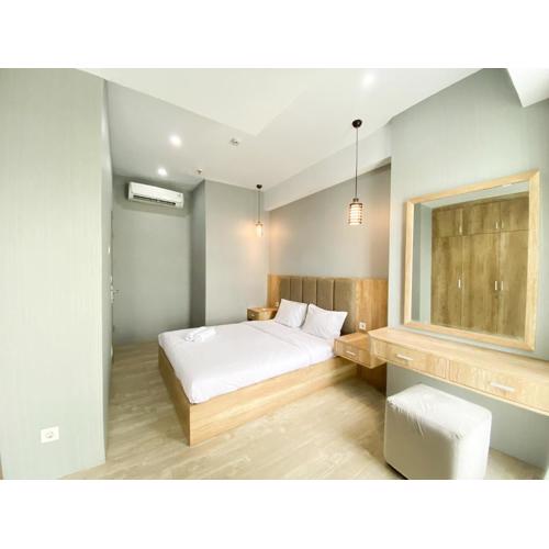 Simply Look and Comfort 1BR Vasanta Innopark Apartment By Travelio