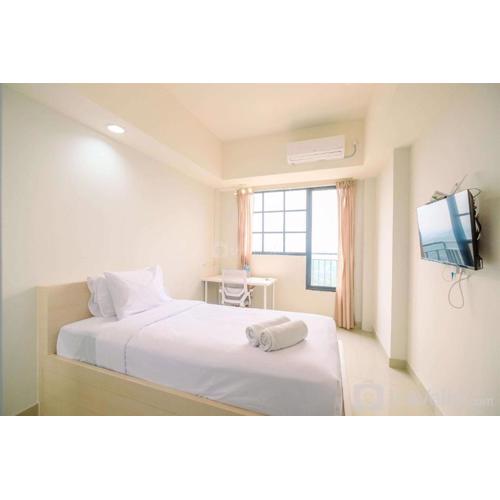 Simply Look Studio at Evenciio Margonda Apartment By Travelio