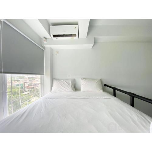 Simply Look Studio Room at Patraland Urbano Apartment By Travelio