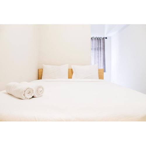 Simply Minimalist 2BR The Springlake Summarecon Apartment By Travelio