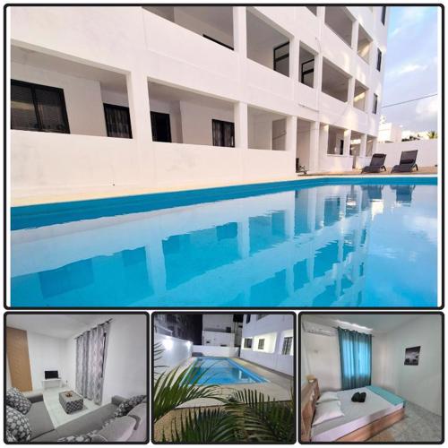 Skyview Apartment- Poolside Stay Near the Beach