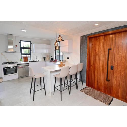 Smart & Modern 2BR Home in Secure Gated Area