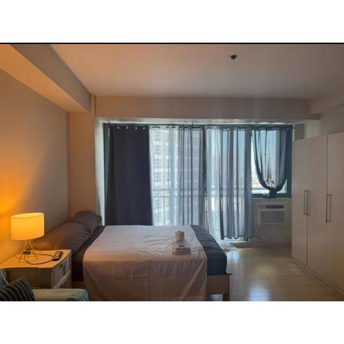 SOHO Central EDSA Shaw Condo Pool front with SMART TV