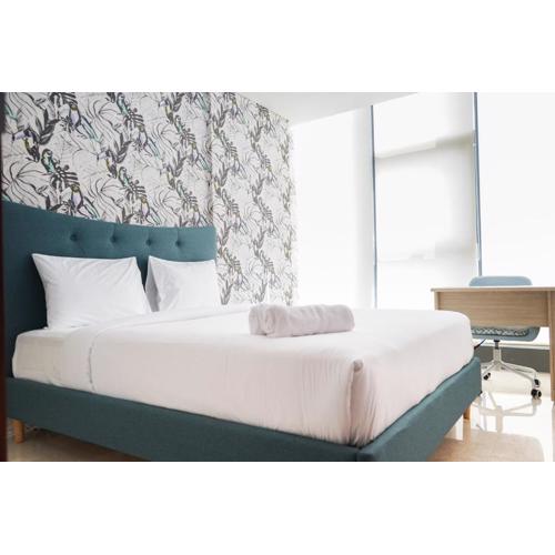 South Tower 2BR at L'Avenue Apartment By Travelio