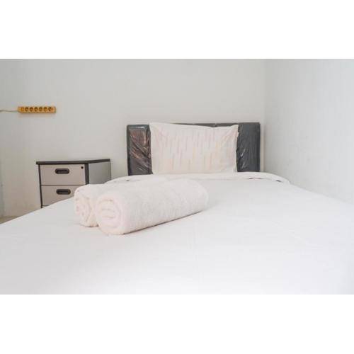 Spacious 1BR Apartment at Menara Rungkut By Travelio