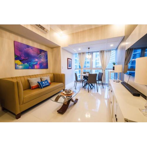 Spacious 2BR Apartment in BGC with Workspace & Washer