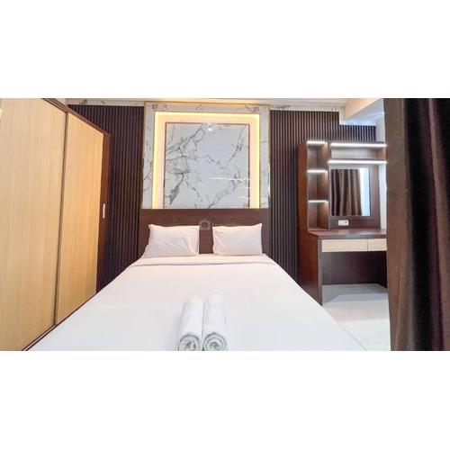 Spacious 2BR at Delft Ciputra Makassar Apartment By Travelio