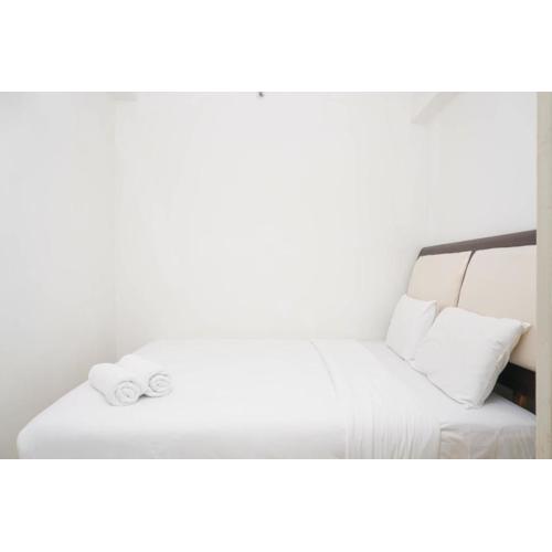 Spacious 2BR Green Bay Pluit Apartment By Travelio