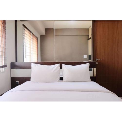 Spacious 3BR Combined Unit at Pinewood Apartment By Travelio