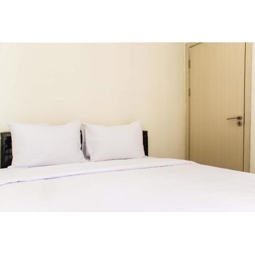 Spacious and Bright 2BR at Meikarta Apartment By Travelio