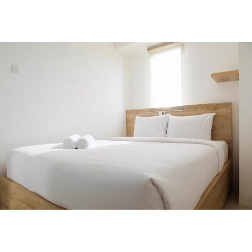 Spacious and Clean 3BR Bassura City Apartment By Travelio