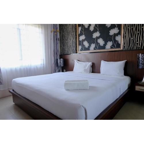 Spacious and Combine 3BR at The Edge Bandung Apartment By Travelio