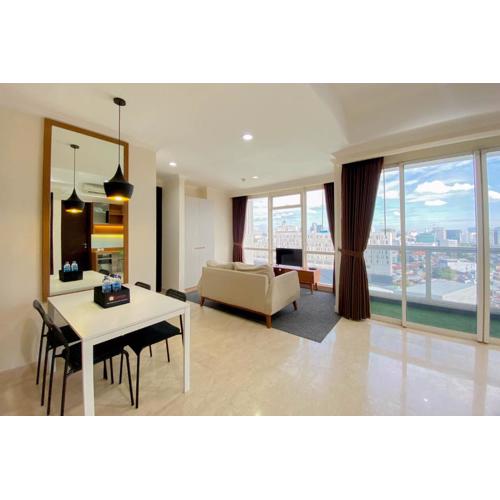 Spacious and Combined 2BR at Menteng Park Apartment By Travelio