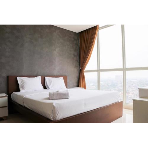 Spacious and Comfy 3BR Ciputra International Apartment By Travelio