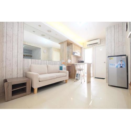 Spacious and Cozy 1BR Bassura City Apartment By Travelio
