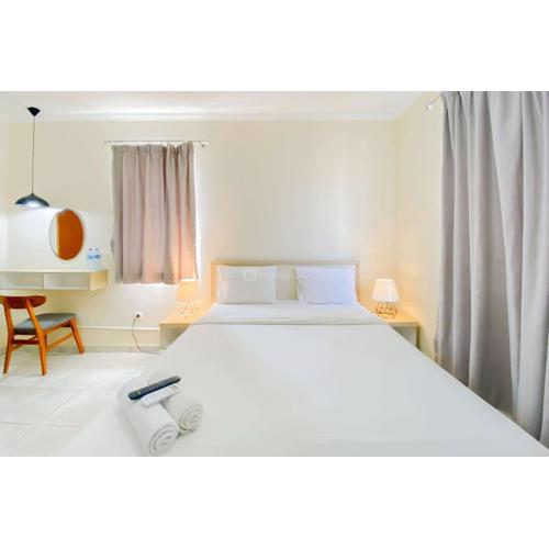 Spacious and Cozy Studio Grand Palace Kemayoran Apartment By Travelio