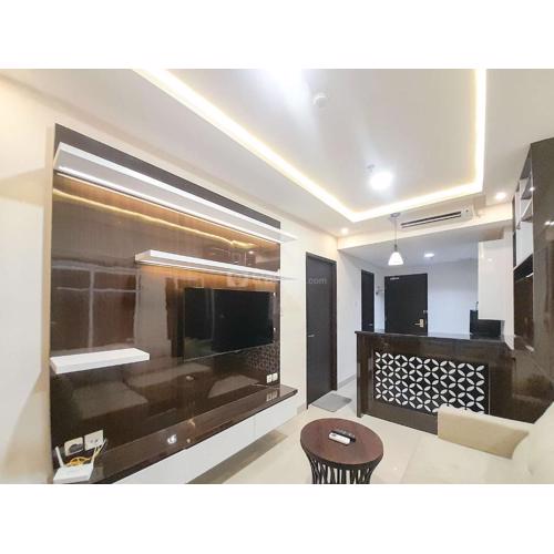 Spacious and Elegant 1BR at Patraland Amarta Apartment By Travelio