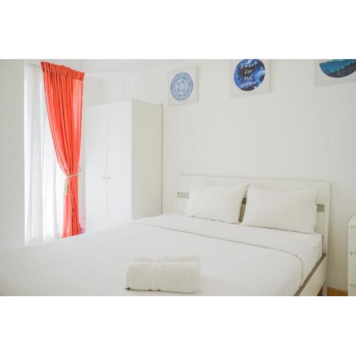 Spacious and Elegant 2BR M-Town Serpong Apartment By Travelio