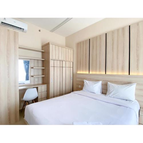 Spacious and Homey 1BR Vasanta Innopark Apartment By Travelio