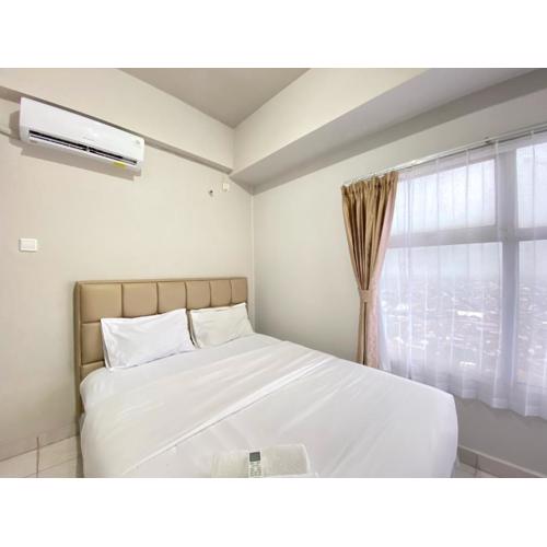 Spacious and Homey 2BR Apartment at Newton Residence By Travelio