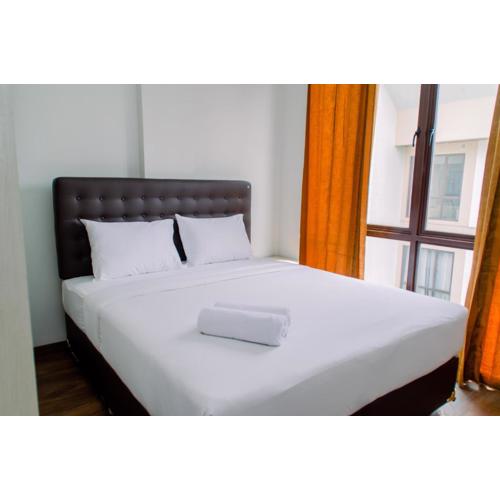 Spacious and Homey 2BR at Asatti Apartment By Travelio